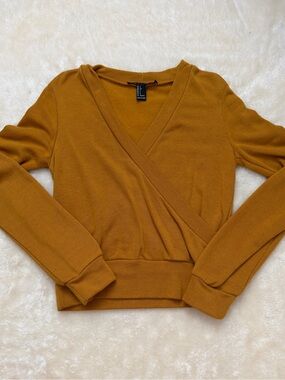 Long sleeved shirt; it's hot to wear. Color: Mustard yellow